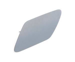 Zaślepka spryskiwacza reflektora strona lewa